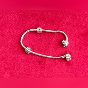 Authentic Pandora Snake Chain Bracelet With 3 Charms.